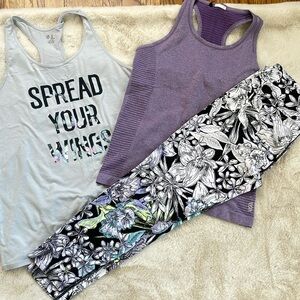 Bundled together. Calvin Klein activewear capris, size Large. 2 tanks included.